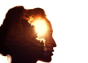 31032692_multiple-exposure-portrait-of-a-woman-the-sun-behind-the-clouds-emotional-intelligence-concept-e1620643471517